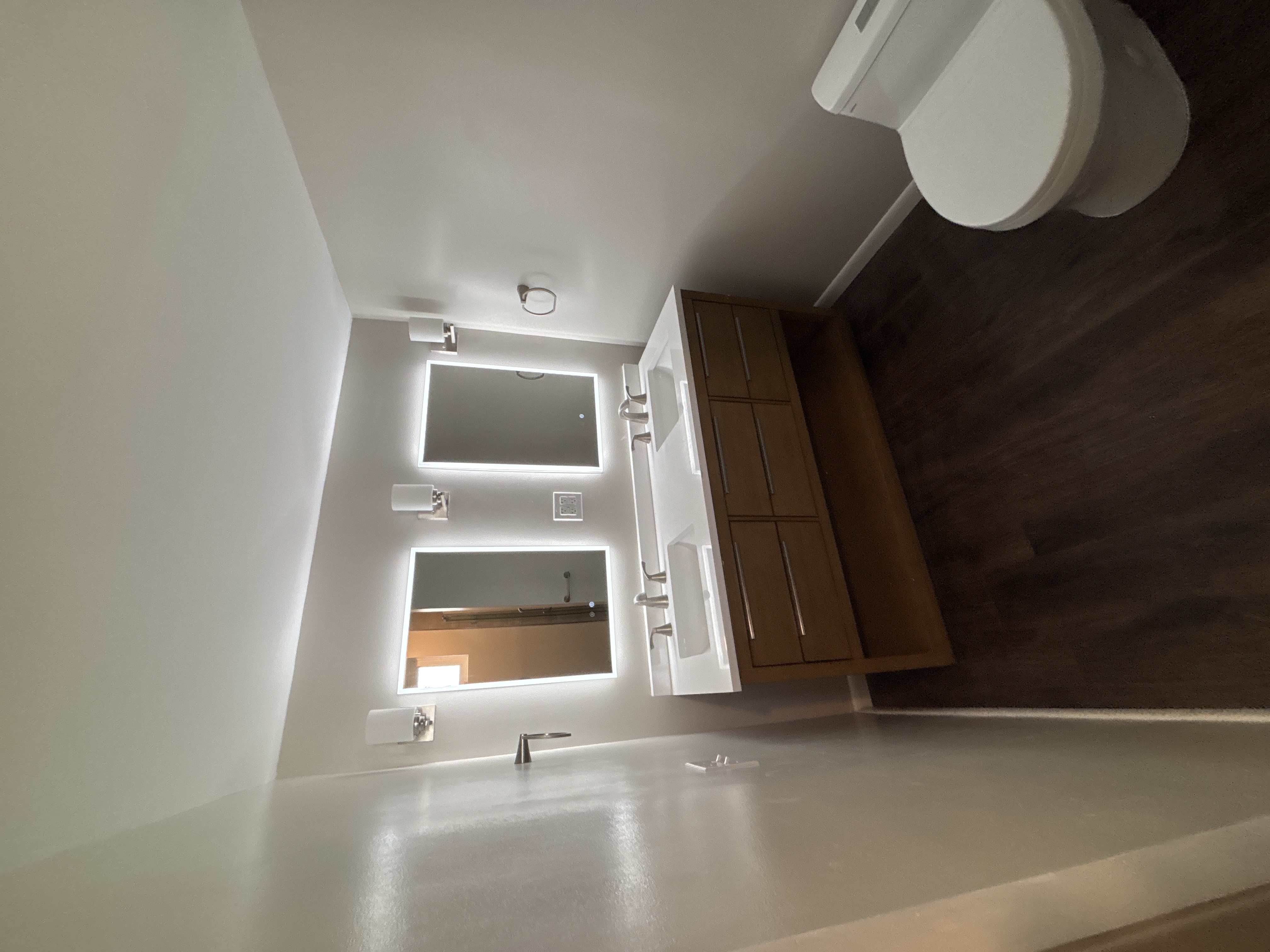 Modern dual vanity with LED mirrors and contemporary design