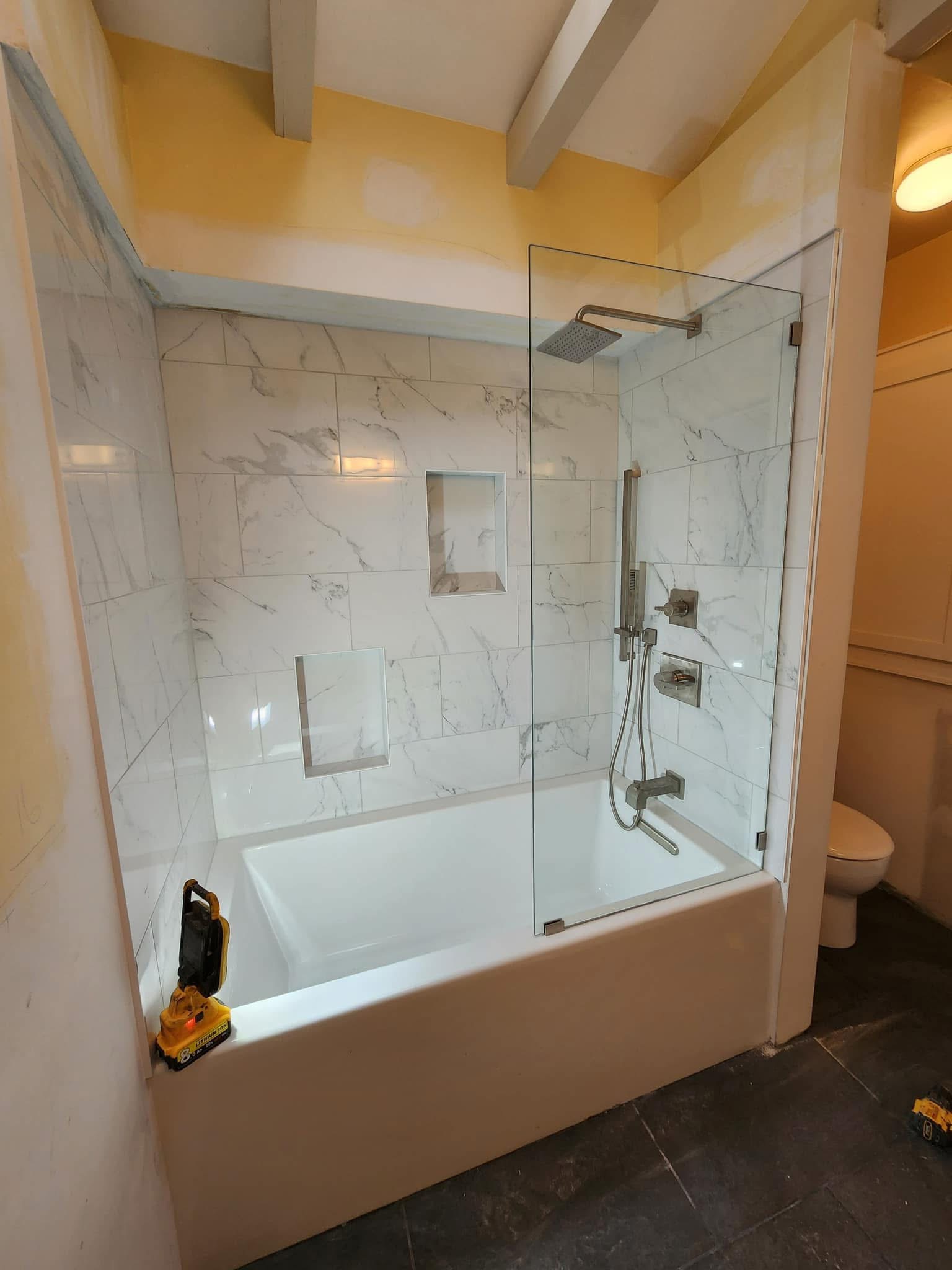 Luxury Bathroom - Marble Tile Tub and Shower Combo